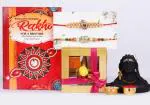 Rakhi gift for brother and bhabi/Set of 2 rakhi for brother with gift/Rakhi for brother with gift/rakhi for brother-2 gold plated Rakhi+Showpiece figurine +Roli,Chawal+Rakshabandhan Greeting card