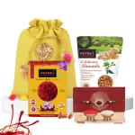 NUTRAJ Rakhi Gift combo of California Almond 500g, Saffron 0.5g, with Rakhi, Roli, Chawal, in Jute Potli