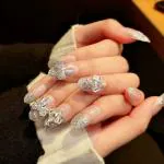 Secret Lives Acrylic Press on Designer Artificial Nails Extension Silver Glitter 3D Crown Bow 24 pcs Set with Glue Sheet
