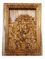 Teak wood carving 'Lion's Prey'