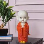 NANTAN Meditating Buddha Monk Statue Decorative Baby Monk Doll Showpiece for Home Decor and Office (10 x 10 x 25 Centimeters) (Orange)