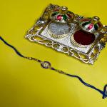 Mahi Gold Plated Blue and White Crystals Floral Rakhi for Brother, Bhai, Bro (RA1100777GBlu)