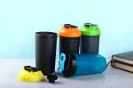 Sharuja Protein Shaker Bottle - Gym Shakers Sipper Bottles with Whisk Mixer Ball, Opaque and Transparent Plastic Shake Tumblers, Black Cap, 700ml(Multi color)