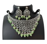 CHAITANYA EMPORIUM Antique Intricate silver necklace with light grren stone drop and earrings