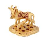 Cow baby showpiece in metal antique gold plated with meena by Handicrafts Paradise