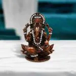 Adhvik Lord Ganesh | Ganpati | Vighanharta Lotus Idol (Prince St-506) Copper Color Metal God Stand Statue for Home/ Mandir/office Table Decor /Car Dashboard Murti Showpiece