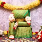 pujaNpujari Fabric Varalakshmi Idol Light Green and Gold Saree Decorative Showpiece (Standard)