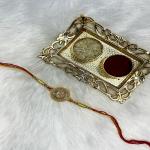 Mahi Gold Plated Round and Swastik Crystal Studed Rakhi for Brother, Bhai, Bro (RA1100778G)