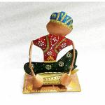 Rekensa Hand-Crafted Metal Showpiece for Decor & Gifting (4 - inch Height, Sitting Musician - Design)