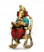 CraftVatika Multicolor Metal Ganesha Reading Statue 23.86 x 14 cm