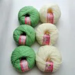 VARDHMAN KNITTING YARN - BABY SOFT (PACK OF 6 BALLS- EACH BALL 25 GM-TOTAL 150 GM) 3 cream and 3 green balls