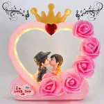 Elegant Lifestyle Love Couple Statue with Music & Light for Home Decor, Girlfriend/Boyfriend Gift Decorative Showpiece - 18 cm  (Polyresin, Pink)