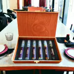 Krishu Ayurveda Madhoshiyan, an exquisite fragrance wooden gift box with golden lock