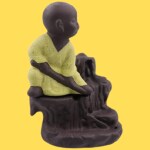Jiyansh Creation Karate Style Monk Buddha Smoke Backflow Incense Holder Home Decorative Showpiece with 10 Free Smoke Backflow Scented Incense Cones (12 CM, Yellow Color)