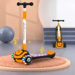 StarAndDaisy Rise 'n' Shine 3 Wheel Scooter for Kids Easy & Portable Fold-N-Carry Design LED Light-Up Deck & Wheel with Music Comfortable & Safe Easy to Ride (3 to 12 Year Kids) (Orange-Black)