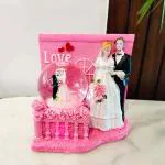 CraftVatika Romantic Love Couple Showpiece with Lighting for Home Decor or Gift - Pack of 1 (Pink)