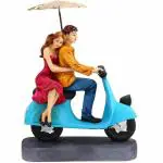 House And Crafts - Multicolor Polyresin Scooter Love Couple With Umbrella Statue - 28 Cm