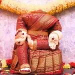 pujaNpujari Varalakshmi Idol Maroon and Yellow Saree (12 Inches) & 1 Agarbatti Packet Free