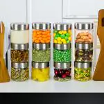 PEARLPET Plus Range Plastic Storage Jars & Containers For Kitchen |Stackable |Air Tight| Steel Cap Jar Set Of 12 Food Grade Boxes For Kitchen storage | Bpa-Free |12 pieces of 200 Ml,Transparent