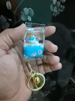 VASUSS Fancy Stylish Glass Toffee Candy Design Water Keychain with Toy inside - Floating Sparkles and Glitters-Cute Keyring for Girls Women-Keyring for Car|Bike|Office and Home Keys-Gift for friends
