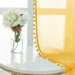 Urban Space Linen Textured Sheer Curtain for Window, Readymade Curtain with Tieback, Eyelets Hanging Style, Set of 2 Curtains - Yellow with pom pom (Window -5 feet x 4 feet)