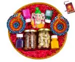 MANTOUSS Diwali dry fruits gift box/Diwali gifts/Diwali gift for friends and family/-Decorated Basket+2 Jars of Dry Fruits(Almond and Cashew)+Showpiece figurine+2 beautiful diya+4 Rangoli Colours+Diwali Card