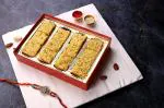 GHASITARAM'S Rakhi Gifts Sweets Box - North Indian Mysore Pak (400 GMS) with Rakhi , Tikka