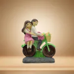 pujaNpujari Love Couple Showpiece Sitting on Cycle for Valentine Gift