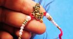 Kavim Kids RAKHI 23561 Gold Finish Rakhi Set (One metal Bal Hanuman ji Rakhi with greeting Card)