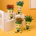 Floweraura Decorative Set Of 4 Artificial Multicolor Succulent Indoor Plants With Cute Avenger Groot Resin Pot Vase For Living Room, Table Corner, Bedroom, Balcony, Office/Home Decor And Gifts For Friends, Relatives, Neighbours & Colleagues
