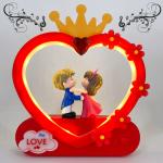 Elegant Lifestyle Creative Love Couple Musical Gift Decor Anniversary Christmas NewYear Valentines Decorative Showpiece - 18 cm  (Polyresin, Red)