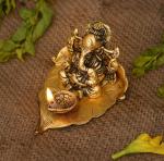 SP Handicrafts Gold Aluminium Leaf Ganesh with Diya Showpiece, 9cm (Pack of 1)
