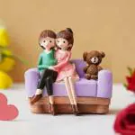 Webelkart Premium Love Couple Sitting On Sofa Statue Valentines Love Couple Showpiece Gifts-Best Gift for Valentines Car Decoration Home Decor (4.5