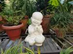 Wonderland Cream Resin Baby Monk Sitting With Folded Hands Statue - 30.48 x 20.32 cm