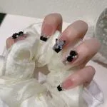 Secret Lives Acrylic Press on Artificial Glossy Designer Fake Nails Extension Nude Skin 3D Butterfly and 3D Black Flowers Fake Nail 24 pcs Set with Manicure Kit