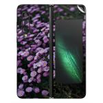 GADGETSWRAP Printed Vinyl Skin Sticker for Samsung Galaxy Fold - tilt shift photo of purple petaled flowers