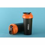 CAYDORA CAYDORA Orange Round High Density Polyethylene Protein Shaker Bottle with Storage Compartment and Stainless Steel Blender Ball 600 ml