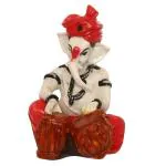 eCraftIndia Embossed Polyresin Lord Ganesha playing Tabla ( 8.8 cm x 12 cm)