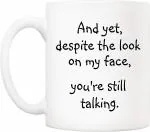 Bains Yet Despite The Look on My face, You're Still Talking Quotes, Ceramic Printed Coffee Mug White, 325 ml Gift for Girls Men Women Girlfriend Boyfriend Husband Wife Gifting Mugs (Still Talking?)