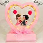 Elegant Lifestyle Love Couple Statue with Music & Light for Home Decor, Girlfriend/Boyfriend Gift Decorative Showpiece - 18 cm  (Polyresin, Pink)