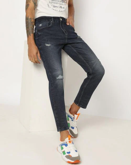 Men Lightly Washed Distressed Skinny Jeans