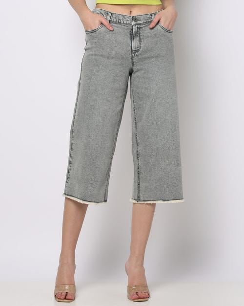 Women Acid-Wash Jeans with Frayed Hems