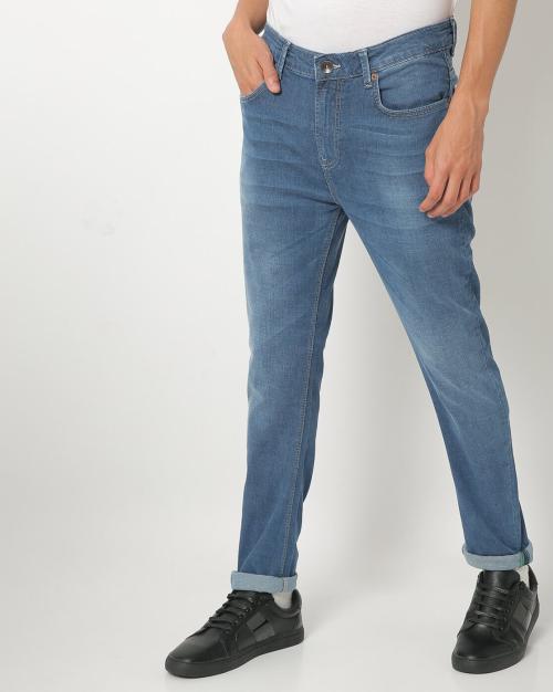 Buy Men Lightly Washed MidRise Carrot Fit Jeans Online at Best Prices