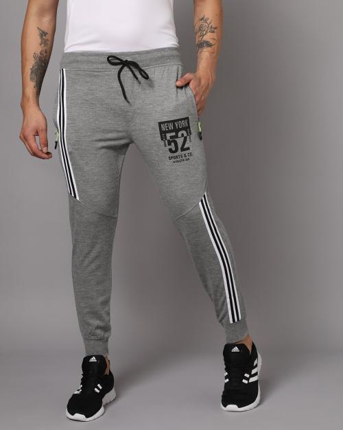 Buy Men Placement Print Joggers with Zip Pocket Online at Best Prices