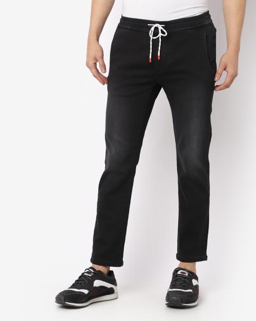 Lightly Washed Jeans with Drawstring Fastening