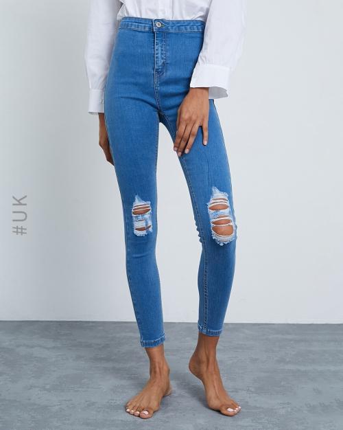 Lightly Washed Distressed Slim Jeans
