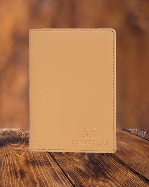 Typographic Embossed Passport Holder