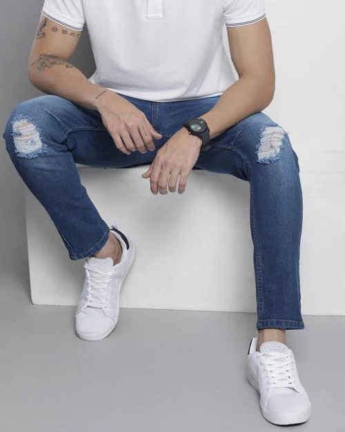 Heavily Washed Distressed Carrot Fit Mid-Rise Slim Jeans