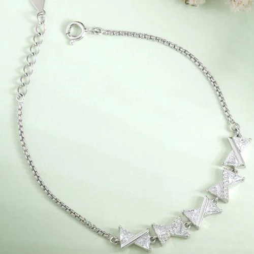 DEESSA Sterling Silver Bow & Solitaire Charm Bracelet - Elegant Silver Bracelet with White Cubic Zirconia - 925 Sterling Silver, Nickel-Free, Rhodium Plated - Perfect Gift for Girls and Women