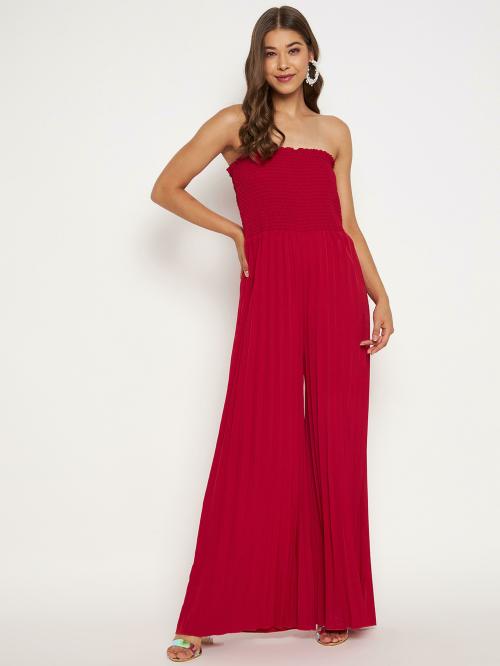 Strapless flared maxi jumpsuit that flatters every body shape. The smocked chest and pleated flared bottom expands and contracts as per the shape of your body. Length of the jumpsuit is apt for the average Indian women's height.